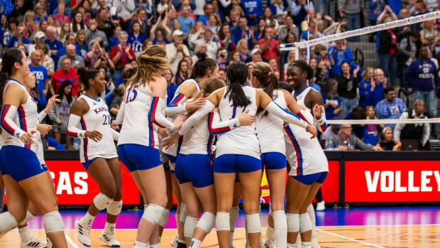 Kansas Volleyball celebrates a win in Horejsi Athletics Center